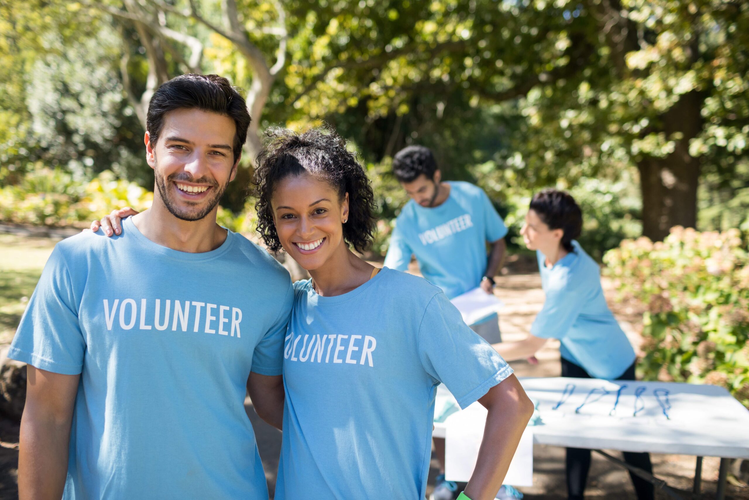 man-and-woman-volunteers-in-blue-shirt